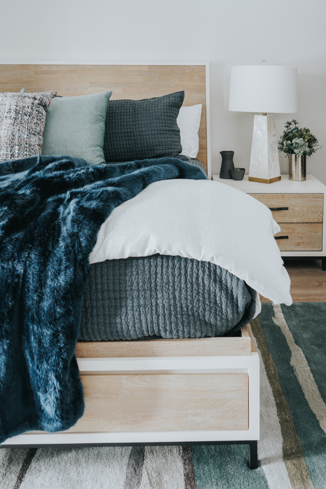 bedroom with area rug and wood-look flooring